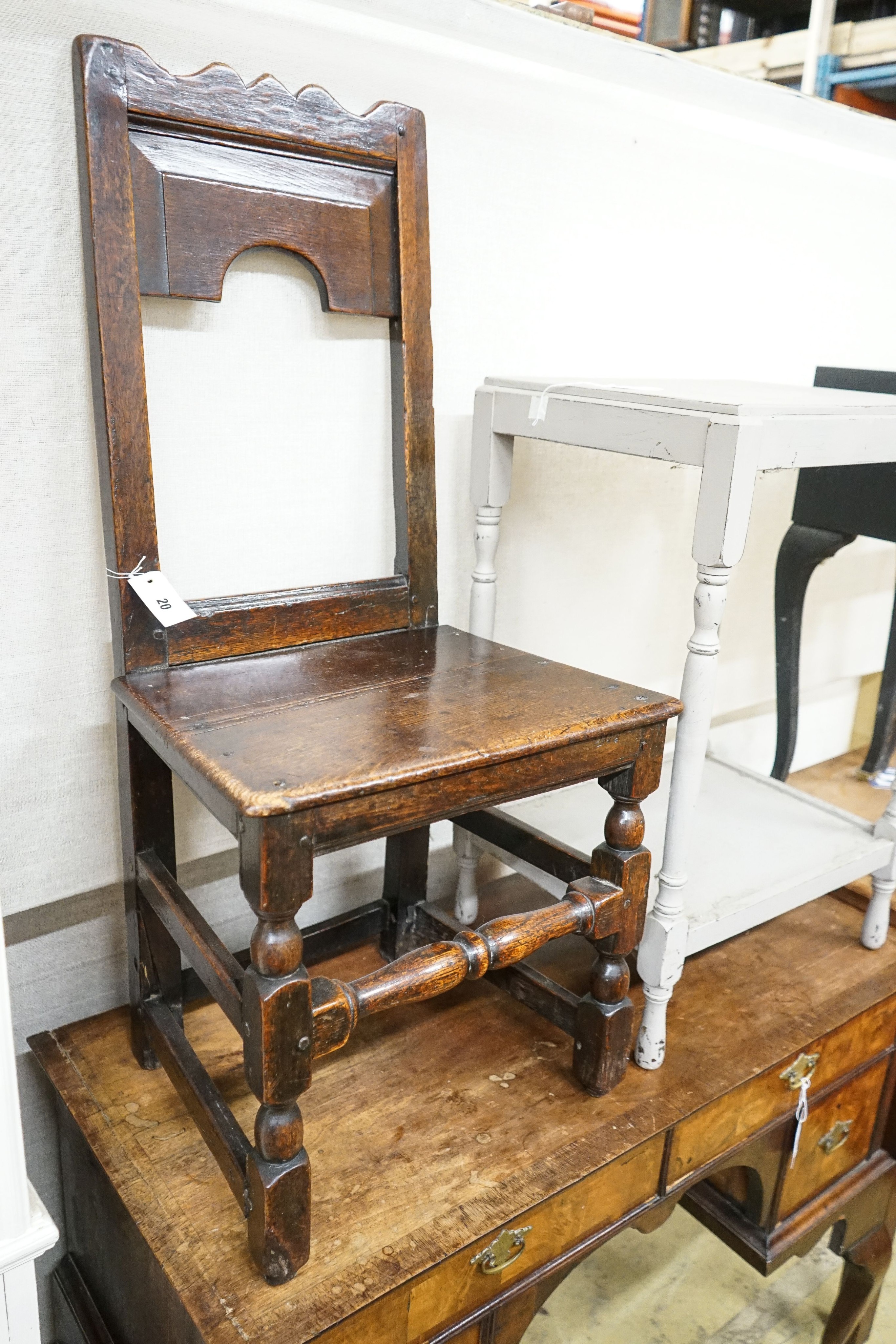 A late 17th century oak back stool, length 46cm, depth 35cm, height 96cm